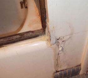 renovating my son s bathroom is this really the same room, bathroom ideas, home improvement, Old water damage around tub