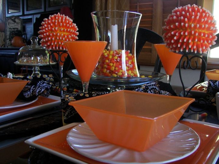 love orange there s more to love about this color than the hue, flowers, home decor, Did you know Each year Americans consume enough Brach s Candy Corn that if laid end to end would circle the earth 4 25 times These too can make a whimsical centerpiece http bit ly SPQkkF