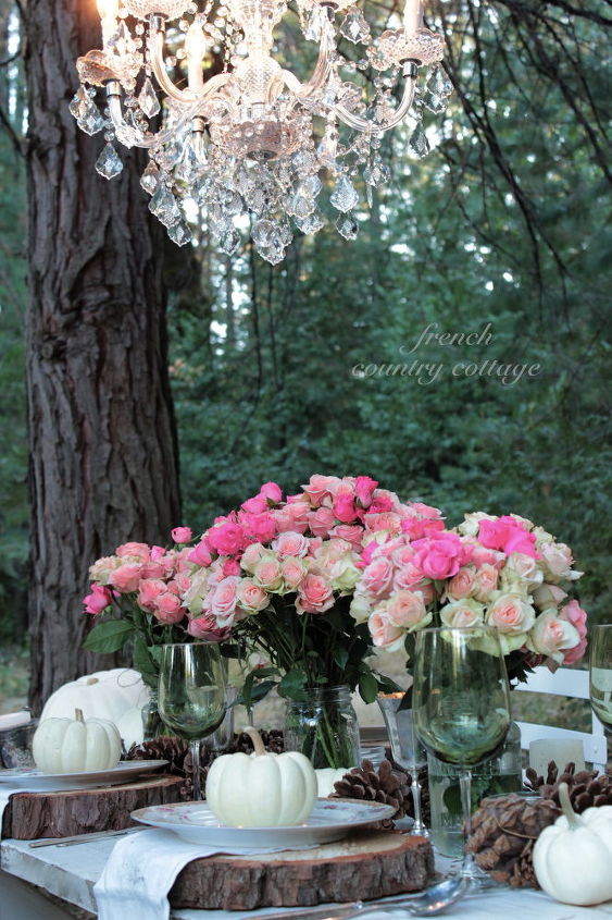 a crystal chandelier above a table in the woods yep i love it, lighting, outdoor living