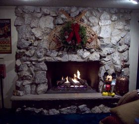 real stone fireplace should it stay or should it go i can t decide, fireplaces mantels, home decor, living room ideas, Here is it sorry the Christmas picture is the only one I currently have It is in great shape and the hearth is also in perfect working condition But is it too dated
