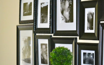 Create a Gallery Wall to Cover Up the Uglies in the Basement