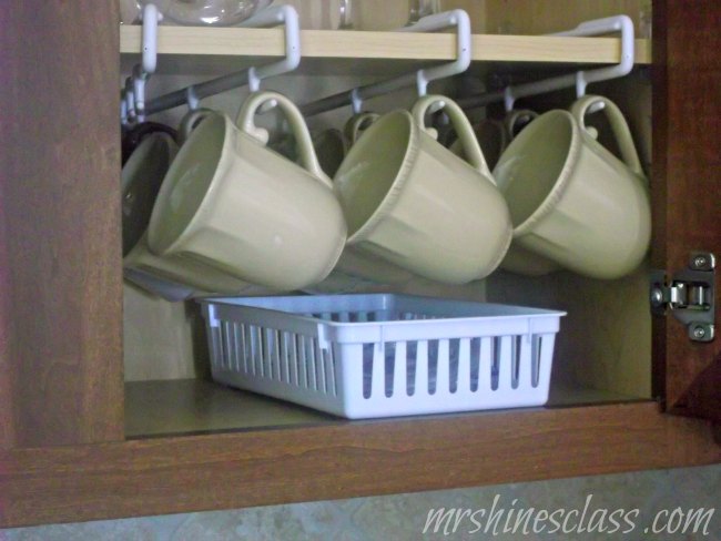 my top tips plus 12 ideas for organizing your kitchen, organizing, Using a mug rack frees up space An inexpensive basket holds lids and straws