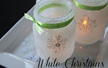 Luminarias de Navidad en tarros de cristal blancos