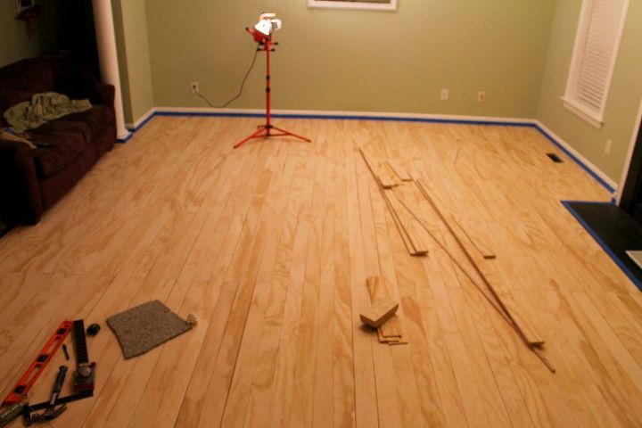 laying plywood floors, flooring, woodworking projects, Here s the family with all the wood laid