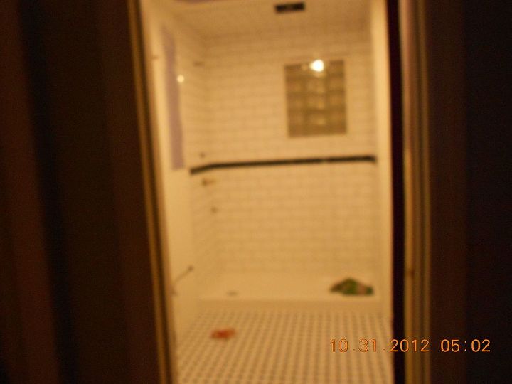a puny 50 s bath remodel, bathroom ideas, home improvement, We deleted a tub and shower and opted for a walk in shower as we are getting older