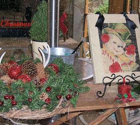 christmas decorations on the porch, christmas decorations, seasonal holiday decor, A vintage ironing board dressed up for the holidays