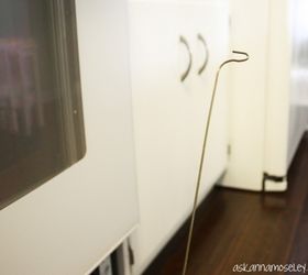 how to clean between oven glass, appliances, cleaning tips, Use a wire hanger to clean between the oven glass