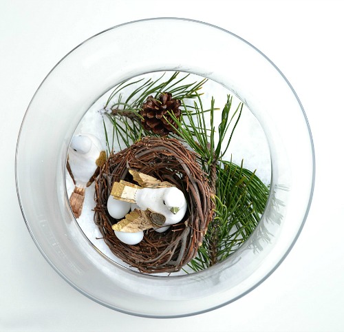 winter nesting make a winter y scene in a glass bowl, crafts, seasonal holiday decor, Start by filling a large glass bowl with fake snow
