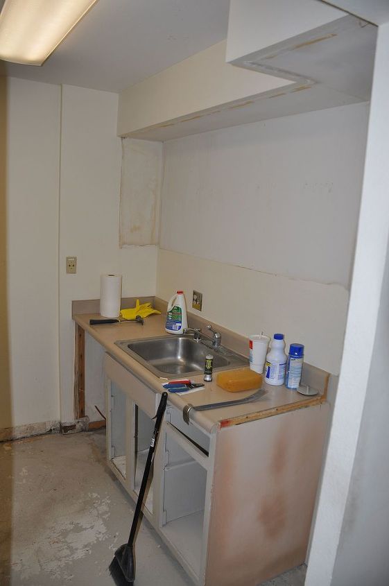 the start of a condo remodel, home improvement, kitchen design, sink side we will keep this running for now running water will be good for paint clean ups etc