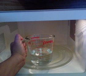 How to clean and disinfect the microwave with just vinegar and water.