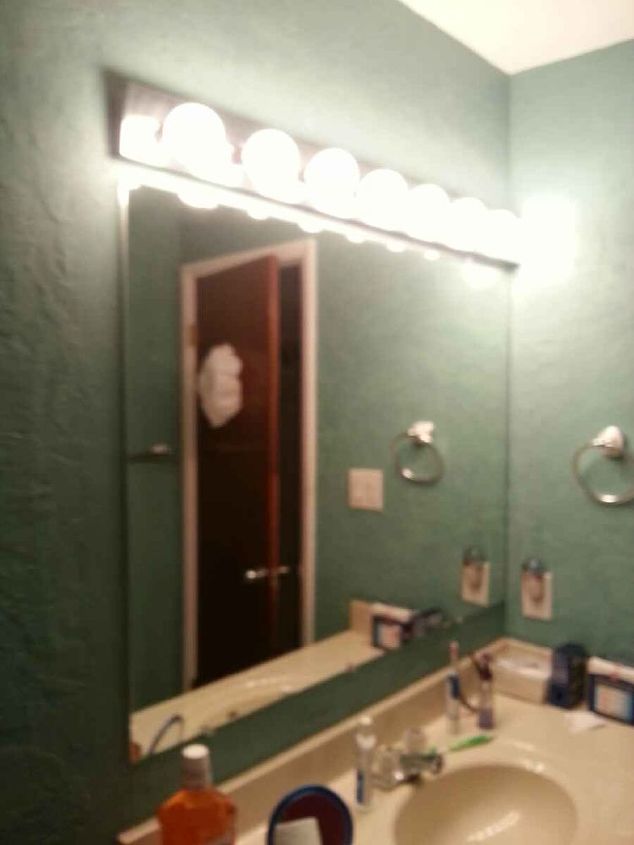 q plank wall with plywood to knock down small bathroom wall, bathroom ideas, concrete masonry, painting, small bathroom ideas, Wall with huge mirror that I want to remove and light bar of course