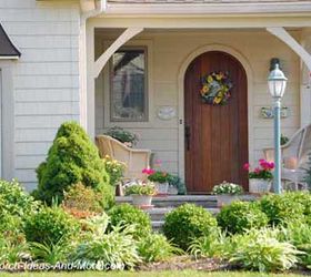 landscaping around your porch, curb appeal, flowers, landscape, A close up of the porch not only shows the sweet arched door but how the plants and flowers lead your eye to it