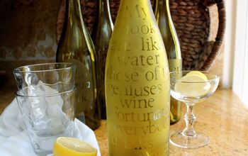 Upcycling empty wine bottles into etched water carafes