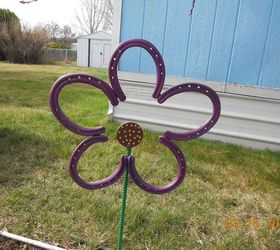 my first flower of spring, flowers, gardening, A wonderful use for old horseshoes