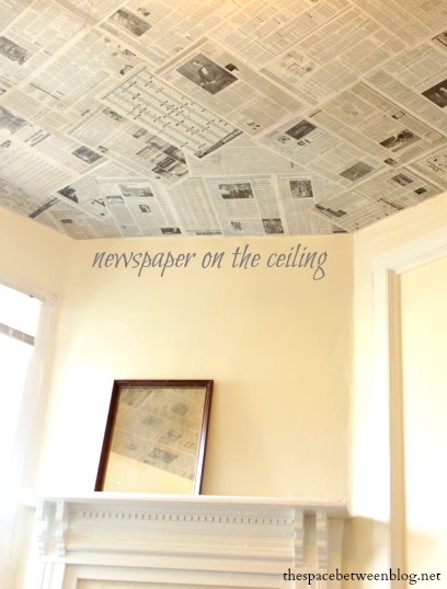 create a focal wall that will hide imperfections for less than 6, home decor, repurposing upcycling, use old newspapers or book pages maps or an atlas as a creative wall covering