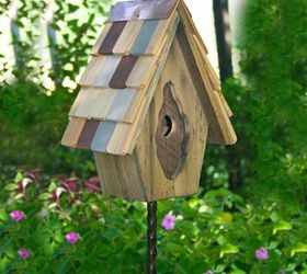 placing birdhouses in the garden, flowers, gardening, Small birdhouses can be placed on small metal or wood post or hung for depending on how you want them to appear in your garden Yard Envy has a lot of choices on housing posts and information on what kind of house will work for you