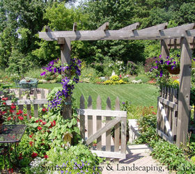make it a focal point turn obstacles into opportunities and champion challenges, flowers, gardening, landscape, outdoor living, The cedar arbor at the top of the steps creates a beautiful frame of the lower flower garden