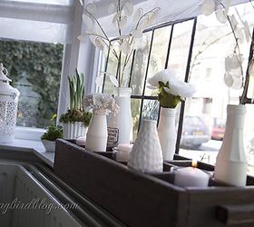 spring decoating on the window sill, home decor, seasonal holiday decor, The contrast between the dark crate and the white accessories adds some drama to this vignette