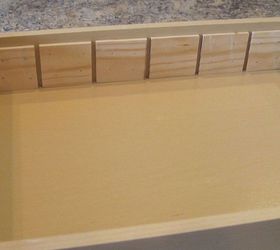 kitchen organization, closet, diy, shelving ideas, storage ideas, woodworking projects, I wanted the unit to be removable so after figuring out the measurements my husband took them nailed these small spacers onto one side of the drawer Eventually the slats would slide into them