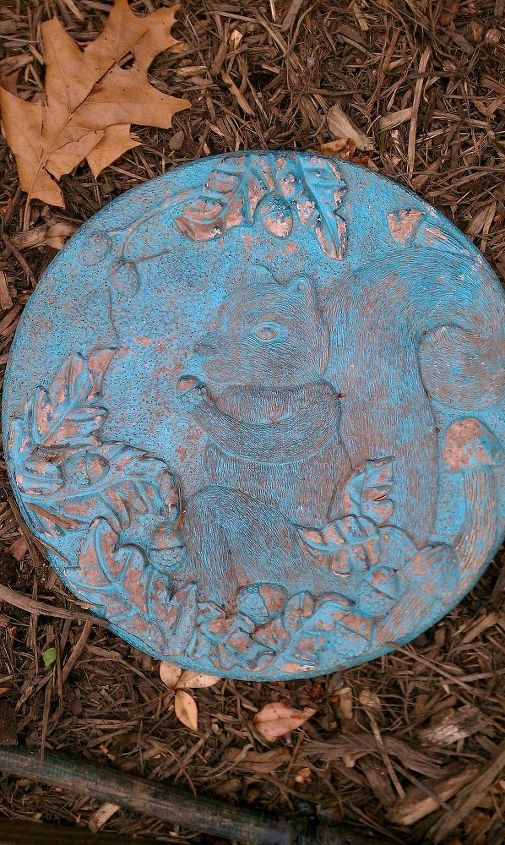 garden stepping stones, crafts, flowers, gardening, outdoor living, painting, This is the before pic of the squirrel stone He wasn t in too bad of shape