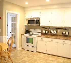 my kitchen and working with what you have, home decor, home improvement, kitchen design, After A wall storage system and a microwave were added The by sliding the stove over I was able to create a safer and more organized kitchen