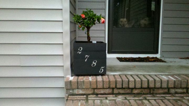pallet planter, flowers, gardening, hibiscus, pallet, repurposing upcycling, Planter made from leftover pallet boards Painted it with the same colors as on the house Painted the house numbers on it and planted a pretty hibiscus in it