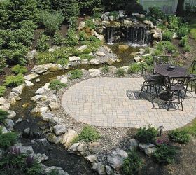 fun beautiful and safe for kids think pondless waterfall and stream, Waterfall and stream are viewed from this patio lounging space