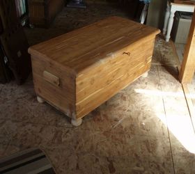 refinished dreamer cedar chest, painted furniture, After using a chemical stripper to remove the lacquer and a through sanding to remove the residual black stain I repaired gouged areas with wood filler then replaced the worn out feet with wooden buns from Lowes