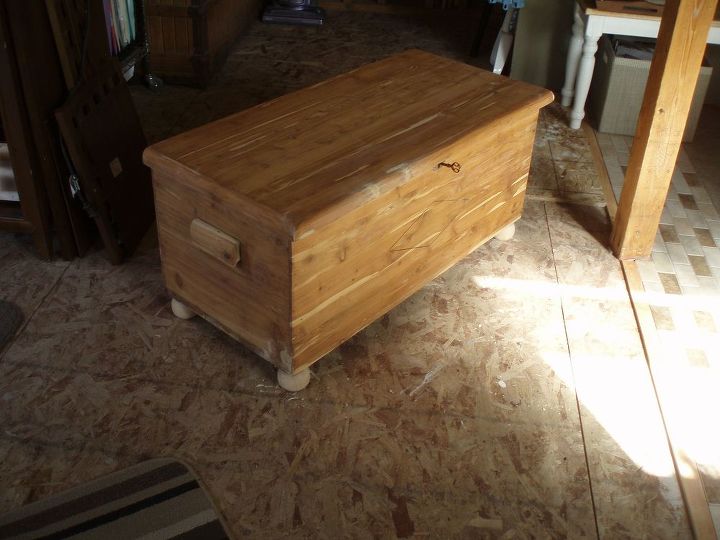 refinished dreamer cedar chest, painted furniture, After using a chemical stripper to remove the lacquer and a through sanding to remove the residual black stain I repaired gouged areas with wood filler then replaced the worn out feet with wooden buns from Lowes