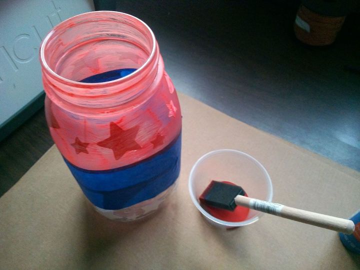 patriotic mason jar luminary, crafts, mason jars, patriotic decor ideas, seasonal holiday decor, Red paint first It took several coats to get coverage I used the acrylic paint for the brushed look and transparency