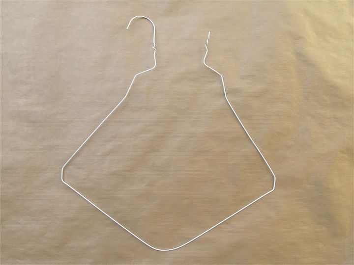 project make a heart from a wire hanger tutorial mysoulfulhome com, crafts, Start with a hanger Untwist it shape it