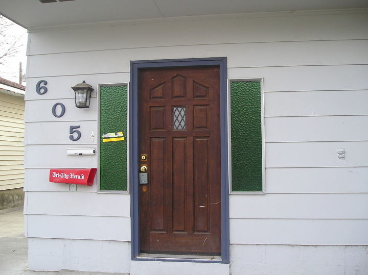 is there a way to paint colored windows, This is my ugly front entry The photo was taken prior to me purchasing the house