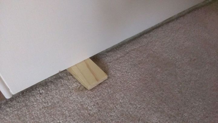 how to fix a door that sticks, If needed use shims to properly align the door with the jamb