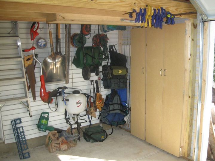 building a backyard shed shop, Cabinets were built to store tools