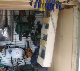 building a backyard shed shop, Drop down storage lifts tools out of the way