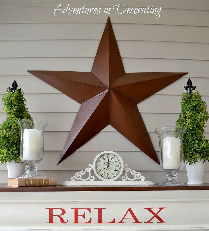 our summer porch, outdoor living, seasonal holiday decor, An oversized metal barn star takes center stage to simple topiaries from Tuesday Morning