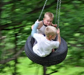 diy old fashioned tire swing, diy, outdoor living, My grandkids love our tire swing It is hung from a large oak tree on a hill so they get lots of height
