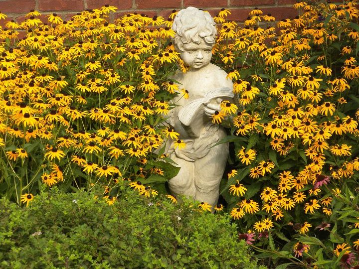 some of the characters in my landscape, gardening, outdoor living, This putti stands 3 tall and weighs 250 He wears a scarf in the winter