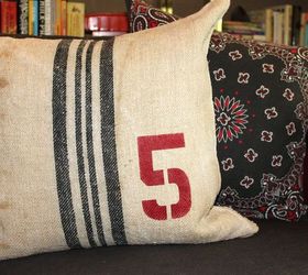 stenciled grain sack pillows, crafts, Number 5 grain sack pillow on the sofa