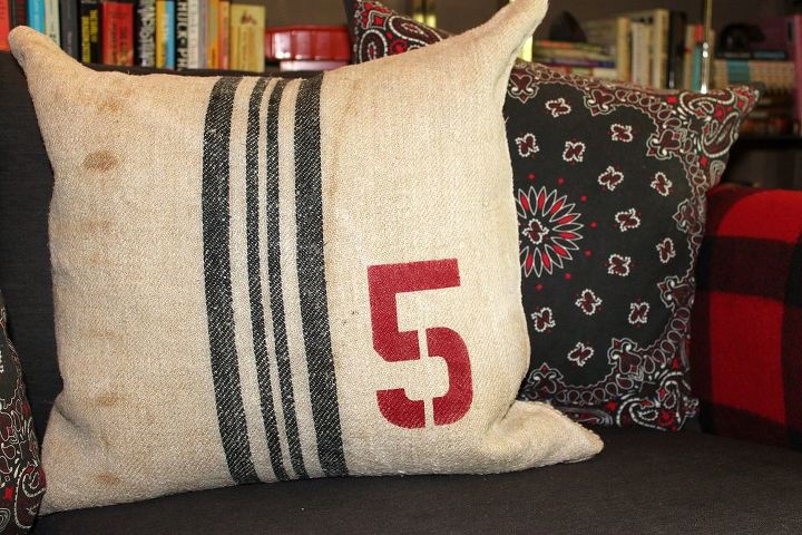 stenciled grain sack pillows, crafts, Number 5 grain sack pillow on the sofa