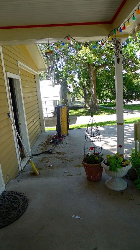 q porch in transition, diy, gardening, outdoor furniture, outdoor living, painted furniture, porches, And then there is this Forgive the pile husband is hauling stuff the burb so the third seat has to sit in time out