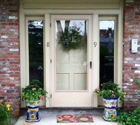 hometour to grandmother s house we go, bathroom ideas, bedroom ideas, home decor, living room ideas, repurposing upcycling, Front entryway done beautifully with Sicilian pottery seasonal wreath and antique knocker