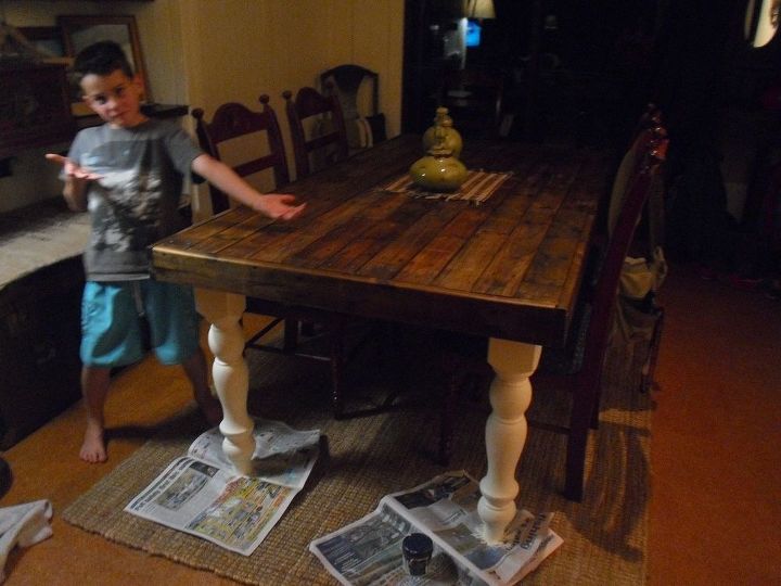 pallet wood farmhouse dining table, painted furniture, legs painted white ready for a distressed finish next is the chairs someone is proud of his mummy