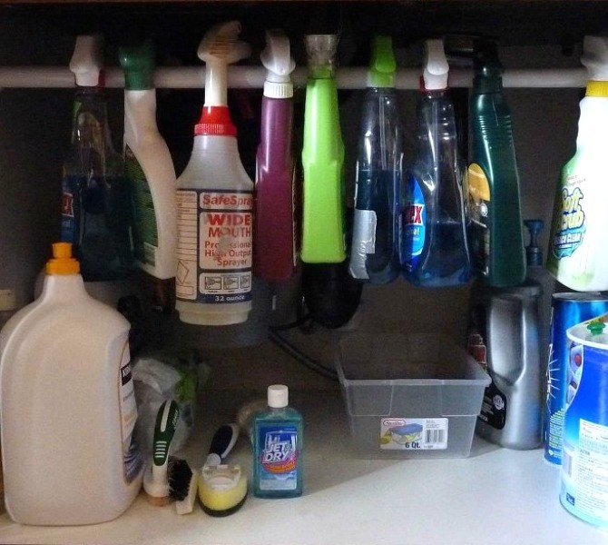 s 13 incredibly useful tension rod ideas you haven t seen yet, crafts, organizing, repurposing upcycling, Bring order to your cleaning materials