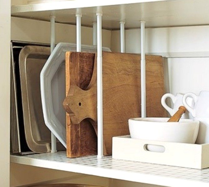 s 13 incredibly useful tension rod ideas you haven t seen yet, crafts, organizing, repurposing upcycling, Keep cutting boards and trays in line