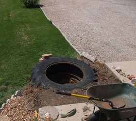 our new pond, outdoor living, ponds water features, He got the tire installed and then dug out the center of the tire deeper
