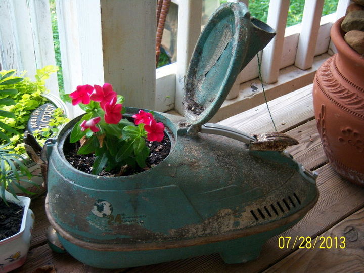 more of my unusual planters, flowers, gardening, repurposing upcycling, Antique vacuum cleaner