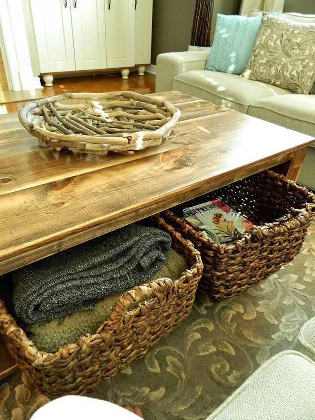 diy rustic coffee table with storage in about 3 or 4 days, diy, painted furniture, rustic furniture, woodworking projects, I m HUGE on storage these baskets hold extra blankets remotes and anything that usually accumulates in a family room