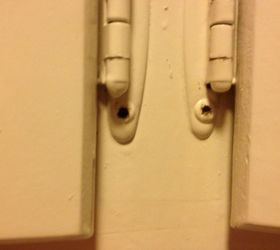 How do you remove painted, striped screws off old cabinet doors?