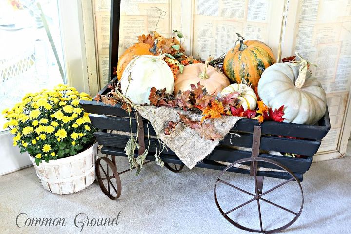 pumpkin filled goat cart and book page screen, repurposing upcycling, seasonal holiday decor